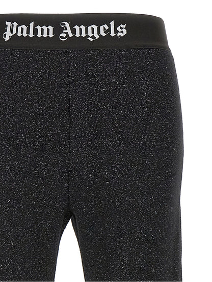 Trousers by Palm Angels for women in cashmere wool lurex & viscose black & jacquard features a tailored silhouette with a tailored flared, defined by its long and a sophisticated .