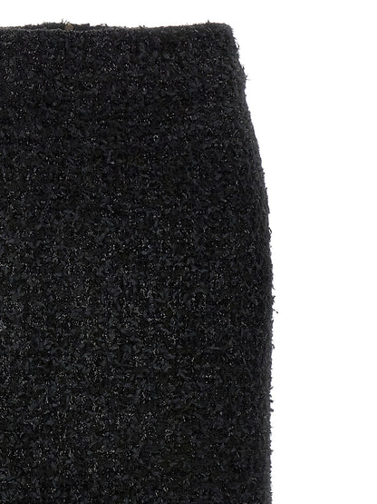 Skirt by Balenciaga for women in polyamide cotton tweed black features an relaxed-yet-refined silhouette that elegantly showcases the Women's Polyamide Cotton Tweed Midi Skirt design and sophisticated midi.