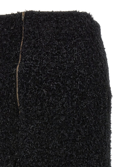 Skirt by Balenciaga for women in polyamide cotton tweed black showcases a dramatic silhouette, artfully capturing the essence of the Women's Polyamide Cotton Tweed Midi Skirt in a dramatic midi cut for a refined look.