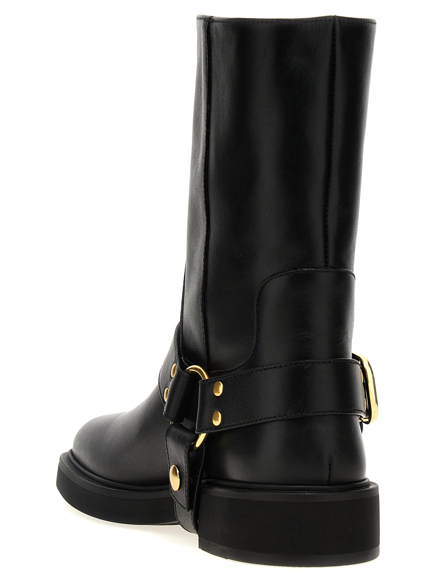 Ankle Boots by Valentino Garavani for women in calfskin leather black, gold & signature features an dynamic silhouette, showcasing the dynamic V Logo Women's Calfskin Leather Ankle Boots design with its distinctive and elegant .