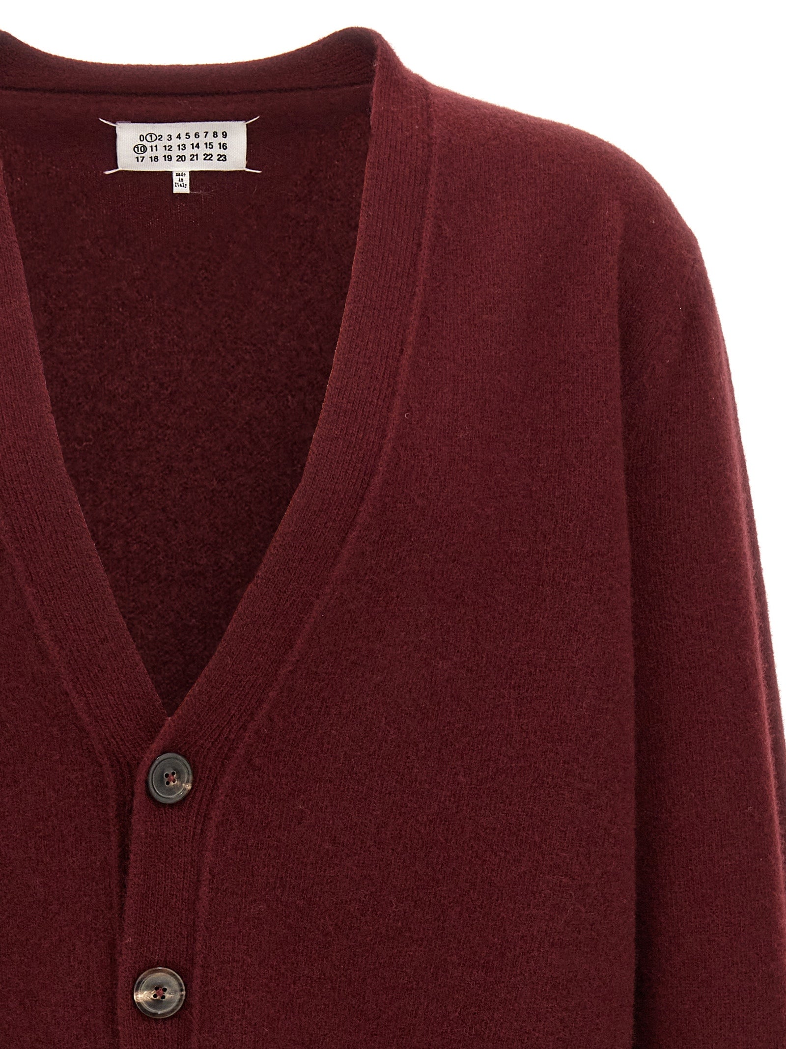 Cardigan by Maison Margiela for men in wool bordeaux features a nuanced silhouette with a refined and nuanced detailing for a sophisticated look.