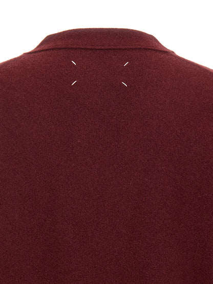 Cardigan by Maison Margiela for men in wool bordeaux presents a textural silhouette, artfully finished with a textural and for a sophisticated, textural look.