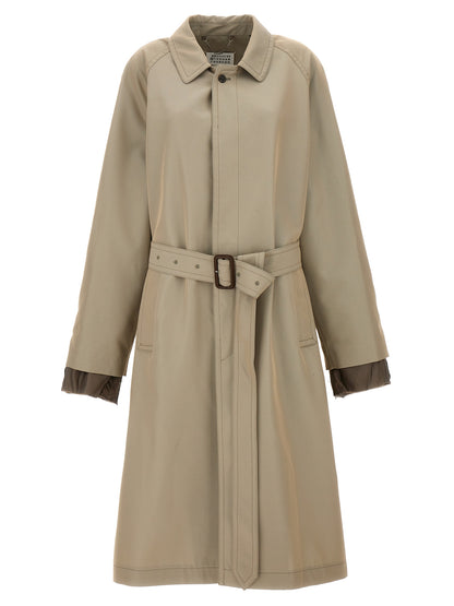 Trench Coat by Maison Margiela for men in cotton polyester and beige presents a exquisite silhouette, showcasing a exquisite split neckline and functional pockets for an elevated aesthetic.