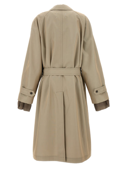 Trench Coat by Maison Margiela for men in cotton polyester beige features an dramatic silhouette, perfectly showcasing the elegant split neckline and sophisticated pockets for a truly dramatic aesthetic.