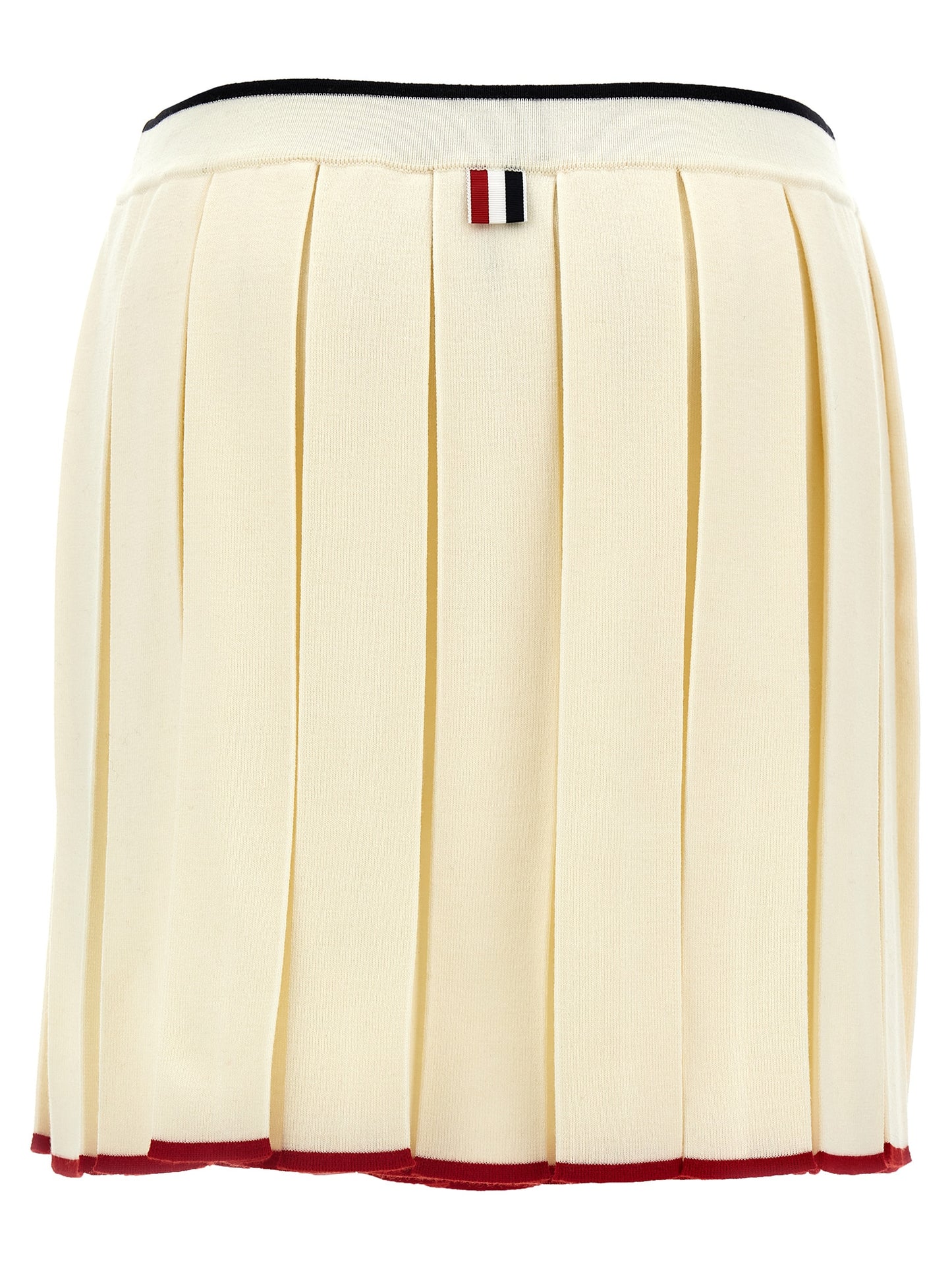 Skirt by Thom Browne for women in virgin wool & polyamide white showcases a sultry silhouette, elegantly defined by its long and the sophisticated sultry design of the Women's Pleated Virgin Wool & Polyamide Long Skirt.