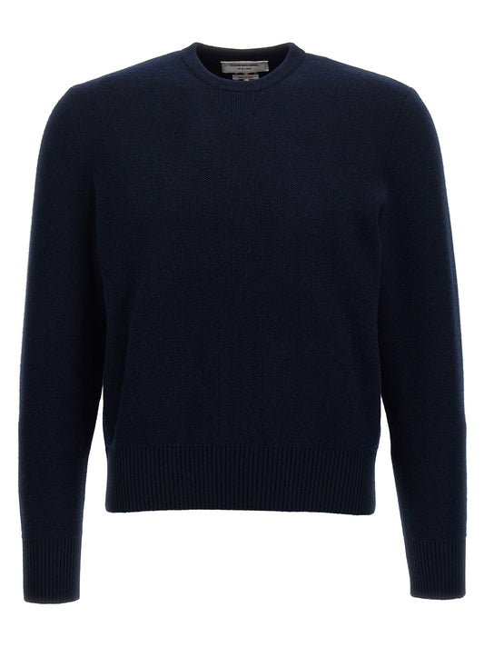 Cardigan by Thom Browne for men in virgin wool blue showcases a luxurious silhouette, meticulously detailed with a sophisticated crew neckline and for a refined finish.