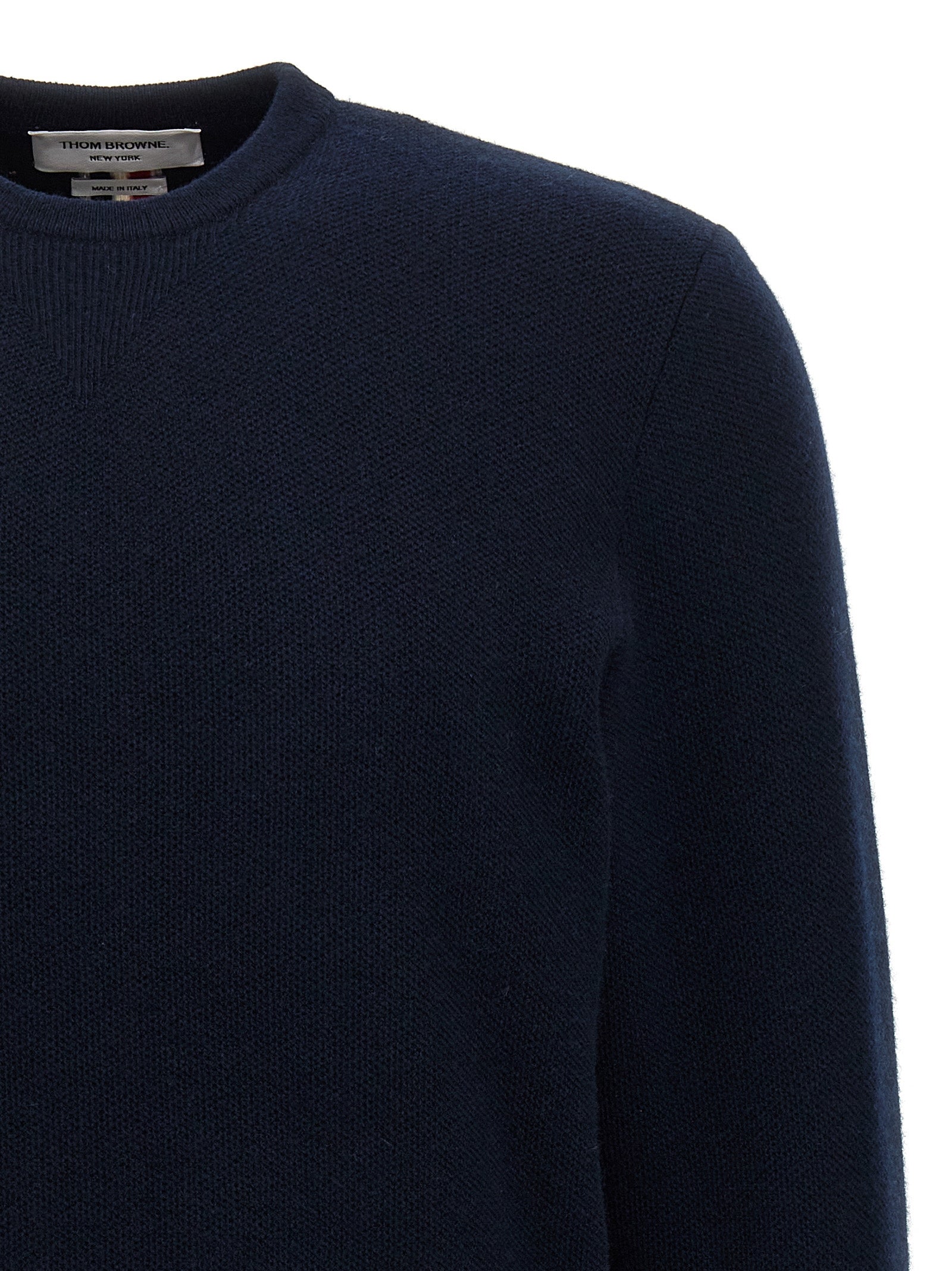 Cardigan by Thom Browne for men in virgin wool blue showcases a luxurious silhouette, meticulously detailed with a sophisticated crew neckline and for a refined finish.