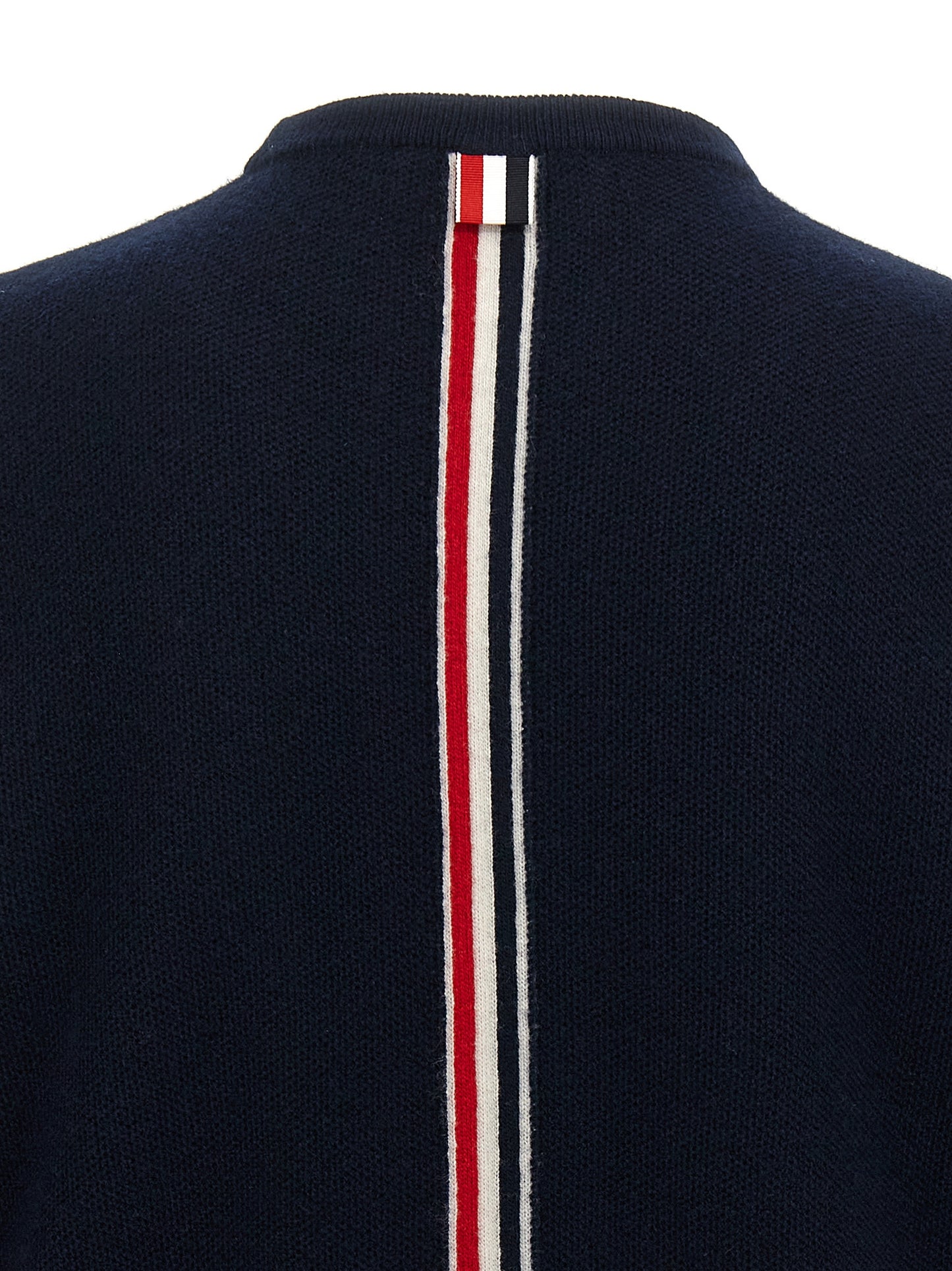 Cardigan by Thom Browne for men in virgin wool blue features an impeccable silhouette, showcasing a sophisticated and detail for a truly impeccable finish.