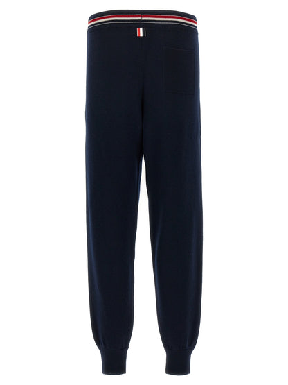 Joggers by Thom Browne for men in cashmere blue features an sophisticated and with a precise long, creating a sophisticated and sophisticated silhouette.