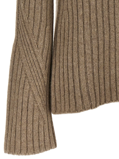 Cardigan by Khaite for women in cashmere beige features a nuanced silhouette with a refined and nuanced detailing for a sophisticated look.