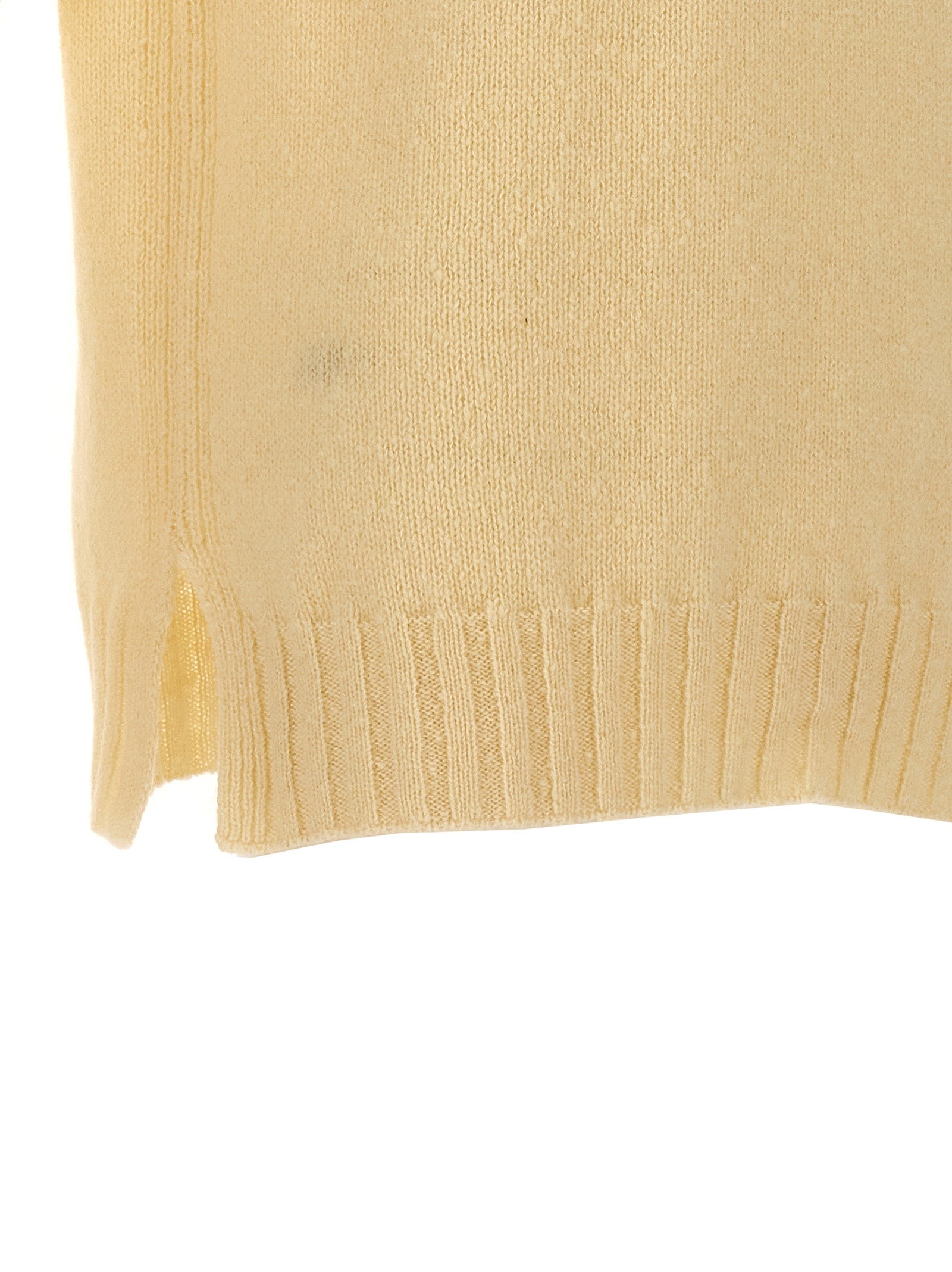 Cardigan by Jil Sander for men in mohair wool polyamide & silk beige showcases a captivating silhouette, artfully detailed with a captivating and for a truly sophisticated captivating look.