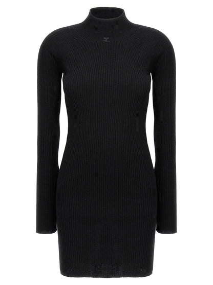 Dress by Courrèges for women in wool cotton black features an cute silhouette, detailed with a long-sleeve and high-neck neckline that elegantly flows into a cute short.