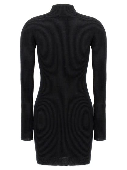Dress by Courrèges for women in wool cotton black features an magnificent silhouette, artfully detailed with a magnificent high-neck neckline and that flows into an magnificent short.