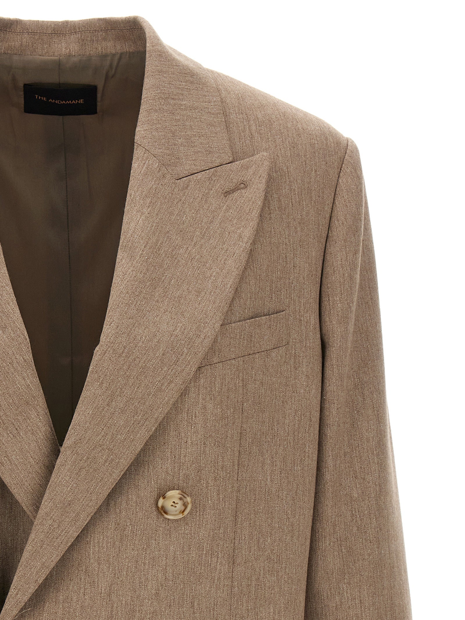 Blazer by The Andamane for women in virgin wool polyester & viscose beige features an sartorial silhouette, showcasing a sophisticated and sartorial for a truly sartorial finish.