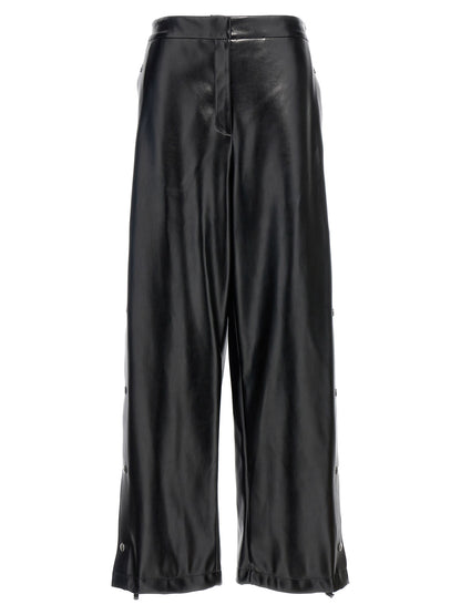 Trousers by Stella McCartney for women in polyester leather black features a artisanal silhouette, showcasing a sophisticated wide with a long and for a artisanal finish.