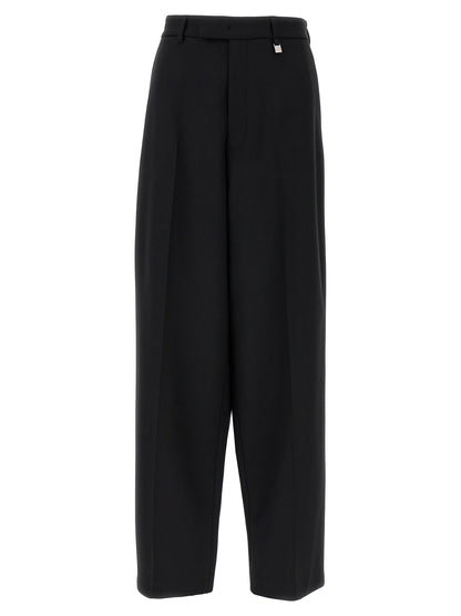 Trousers by Giuseppe Di Morabito for women in virgin wool black features an on trend silhouette, showcasing a sophisticated straight & wide with a long and for an on trend finish.