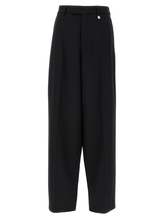 Trousers by Giuseppe Di Morabito for women in virgin wool black features an on trend silhouette, showcasing a sophisticated straight & wide with a long and for an on trend finish.