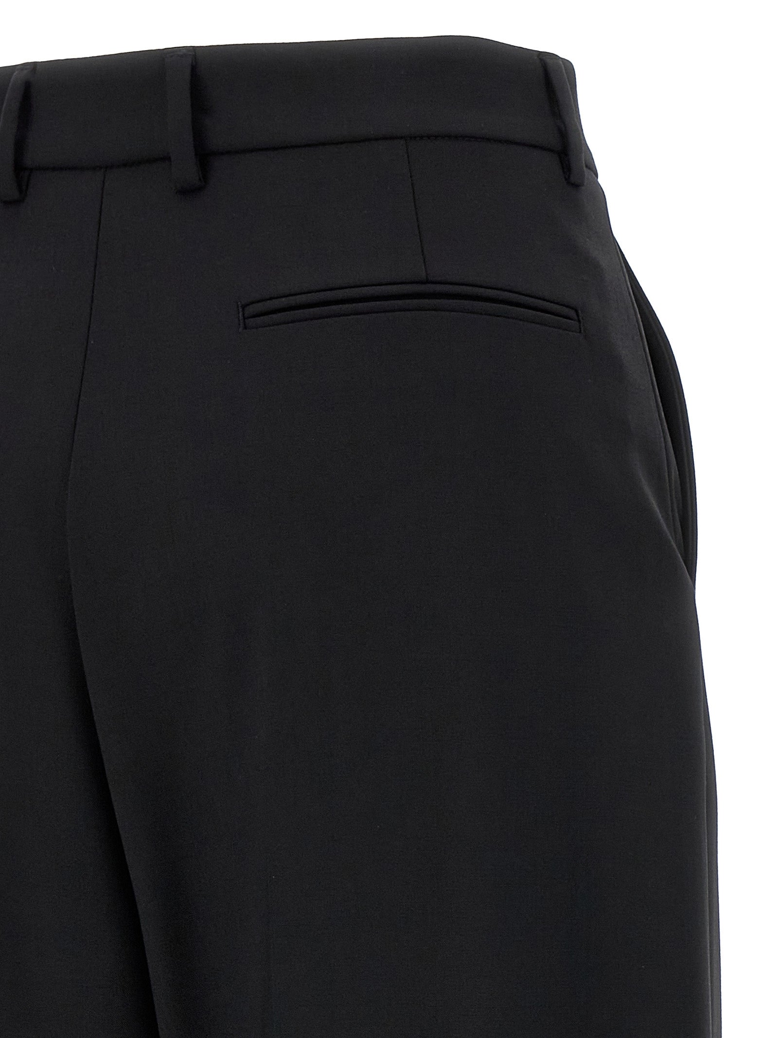 Trousers by Giuseppe Di Morabito for women in virgin wool black presents a perennial silhouette, meticulously tailored with a straight & wide cut, long finish, and an elegant .