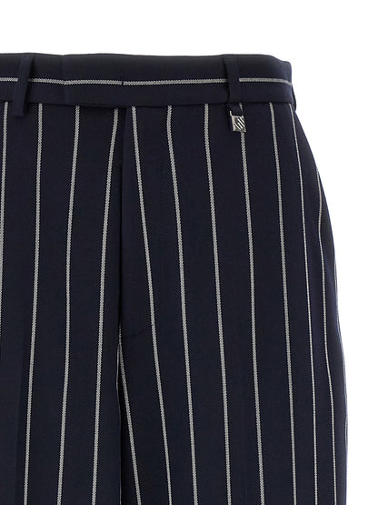 Trousers by Giuseppe Di Morabito for women in stretch viscose polyester blue & striped presents a perennial silhouette, meticulously tailored with a straight-leg cut, long finish, and an elegant .