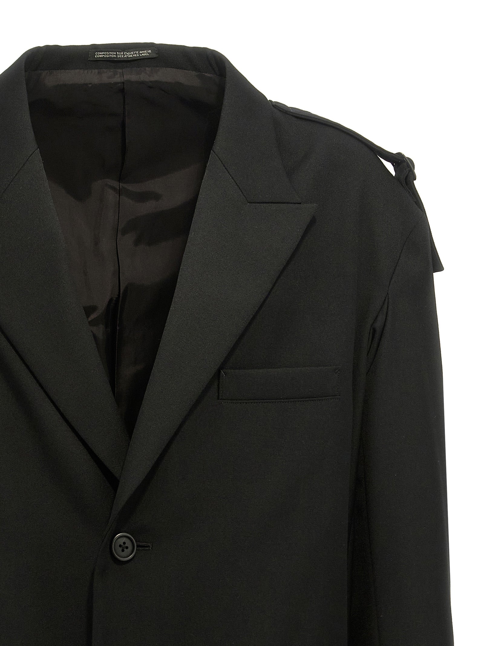 Blazer by Yohji Yamamoto for men in wool black presents a distinguished silhouette, detailed with a distinguished and distinctive for a truly sophisticated finish.