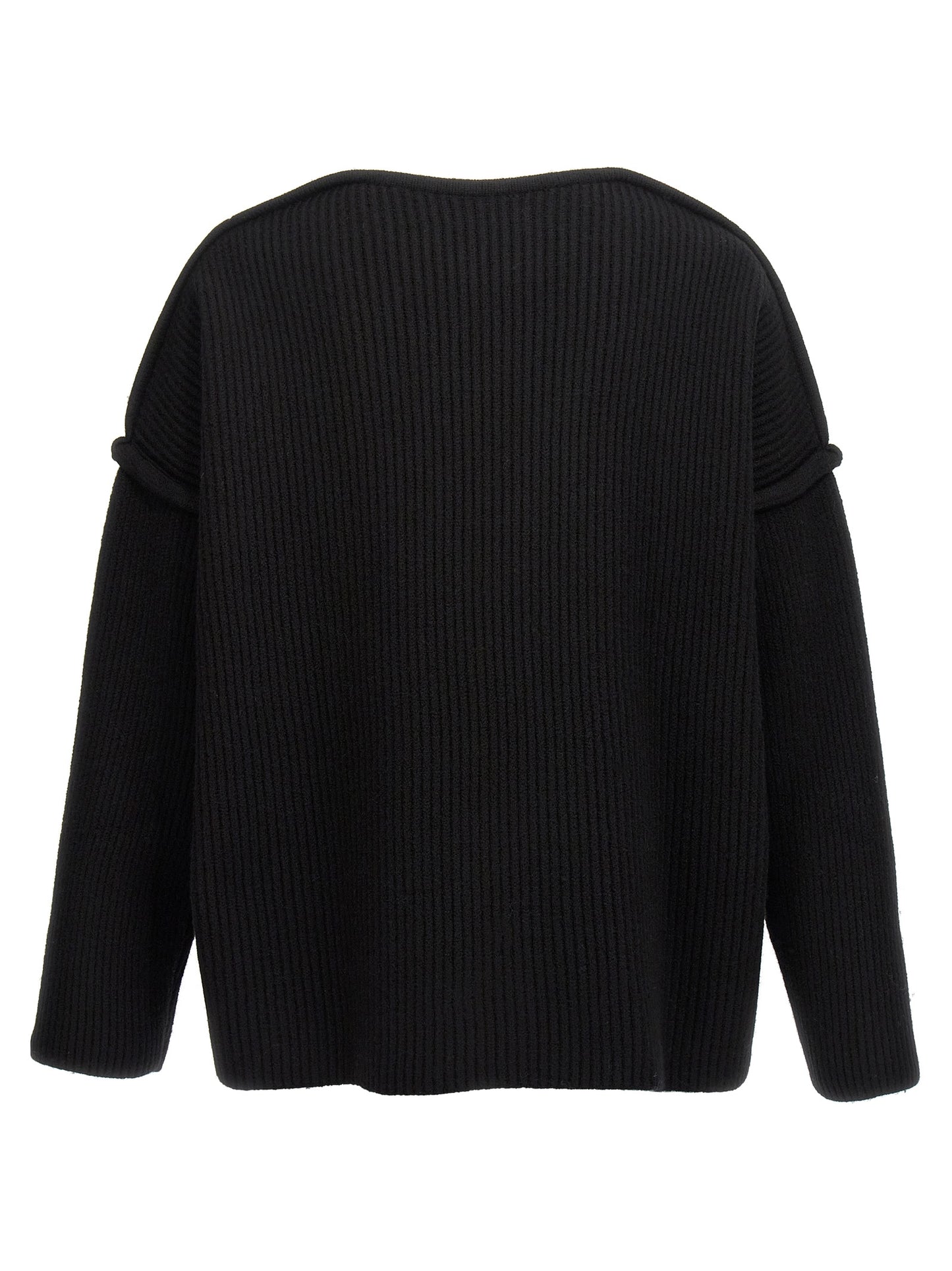 Cardigan by Jil Sander for men in wool black showcases a captivating silhouette, artfully detailed with a captivating and for a truly sophisticated captivating look.