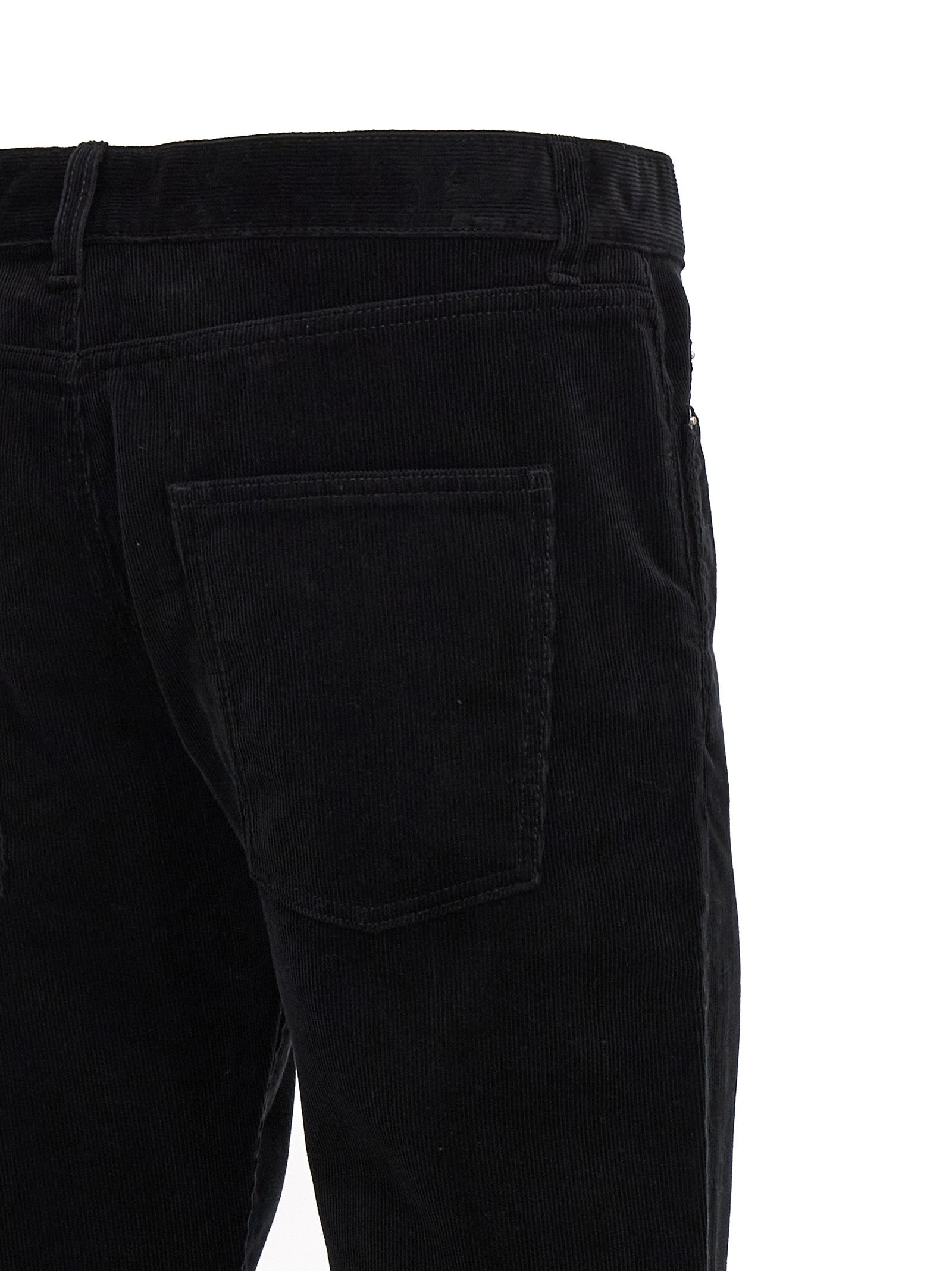 Trousers by Saint Laurent for men in cotton corduroy black features a tailored silhouette with a tailored , defined by its long and a sophisticated mid rise.