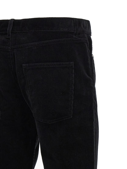 Trousers by Saint Laurent for men in cotton corduroy black features a tailored silhouette with a tailored , defined by its long and a sophisticated mid rise.