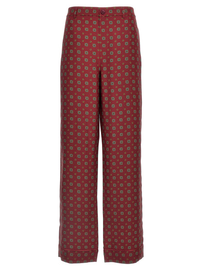 Chinos Pants by Moschino for women in silk bordeaux, patterned & print, featuring a architectural with a architectural long and for a refined silhouette.