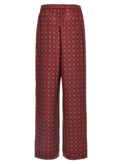 Chinos Pants by Moschino for women in silk bordeaux, patterned & print features an sharp and long with a , highlighting a sharp silhouette for a sophisticated look.