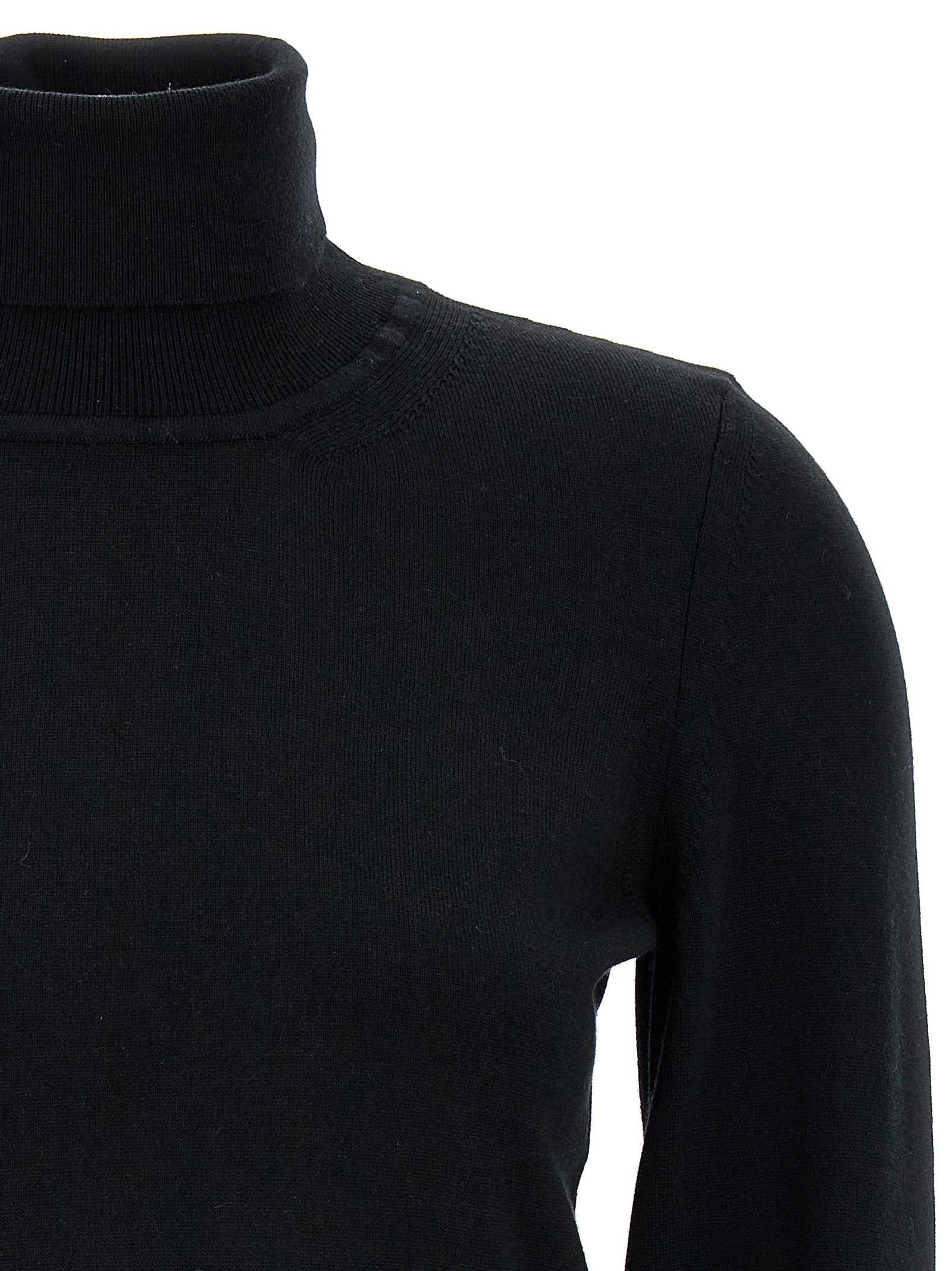 Cardigan by ANTONINO VALENTI for women in merino wool black presents a textural silhouette, artfully finished with a textural and for a sophisticated, textural look.