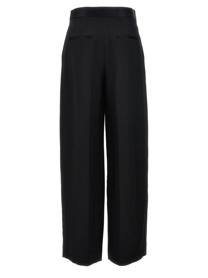 Trousers by Khaite for women in polyamide viscose black features a tailored silhouette with a tailored wide, defined by its long and a sophisticated .