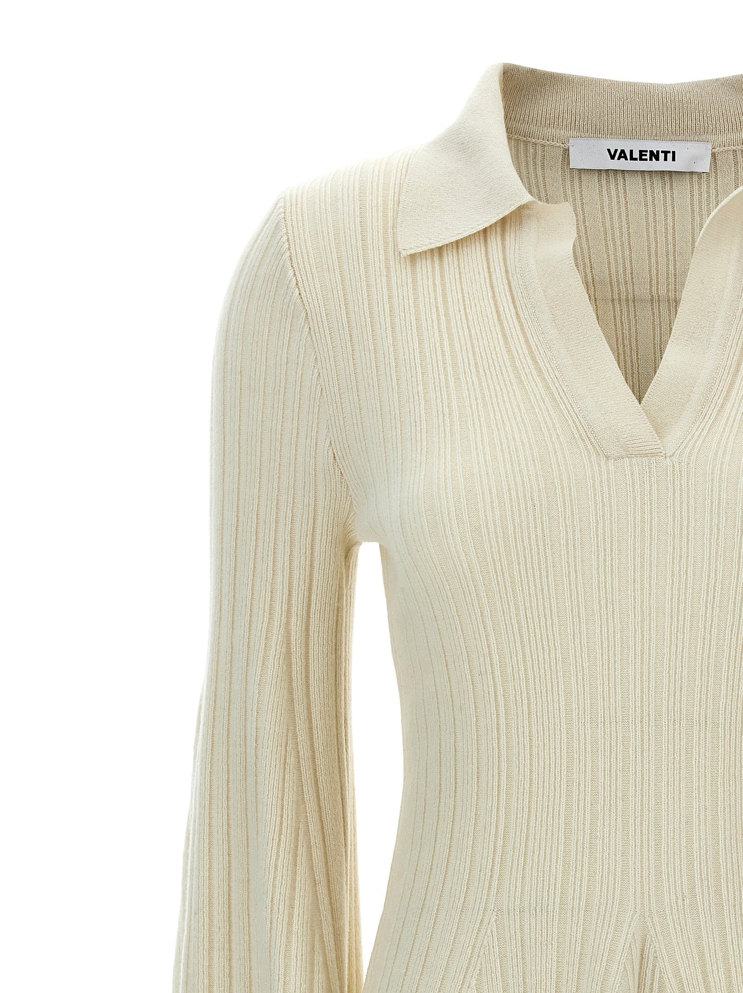 Skirt by ANTONINO VALENTI for women in plush cashmere white showcases a sultry silhouette, elegantly defined by its mini and the sophisticated sultry design of the Women's Plush Cashmere Mini Skirt.