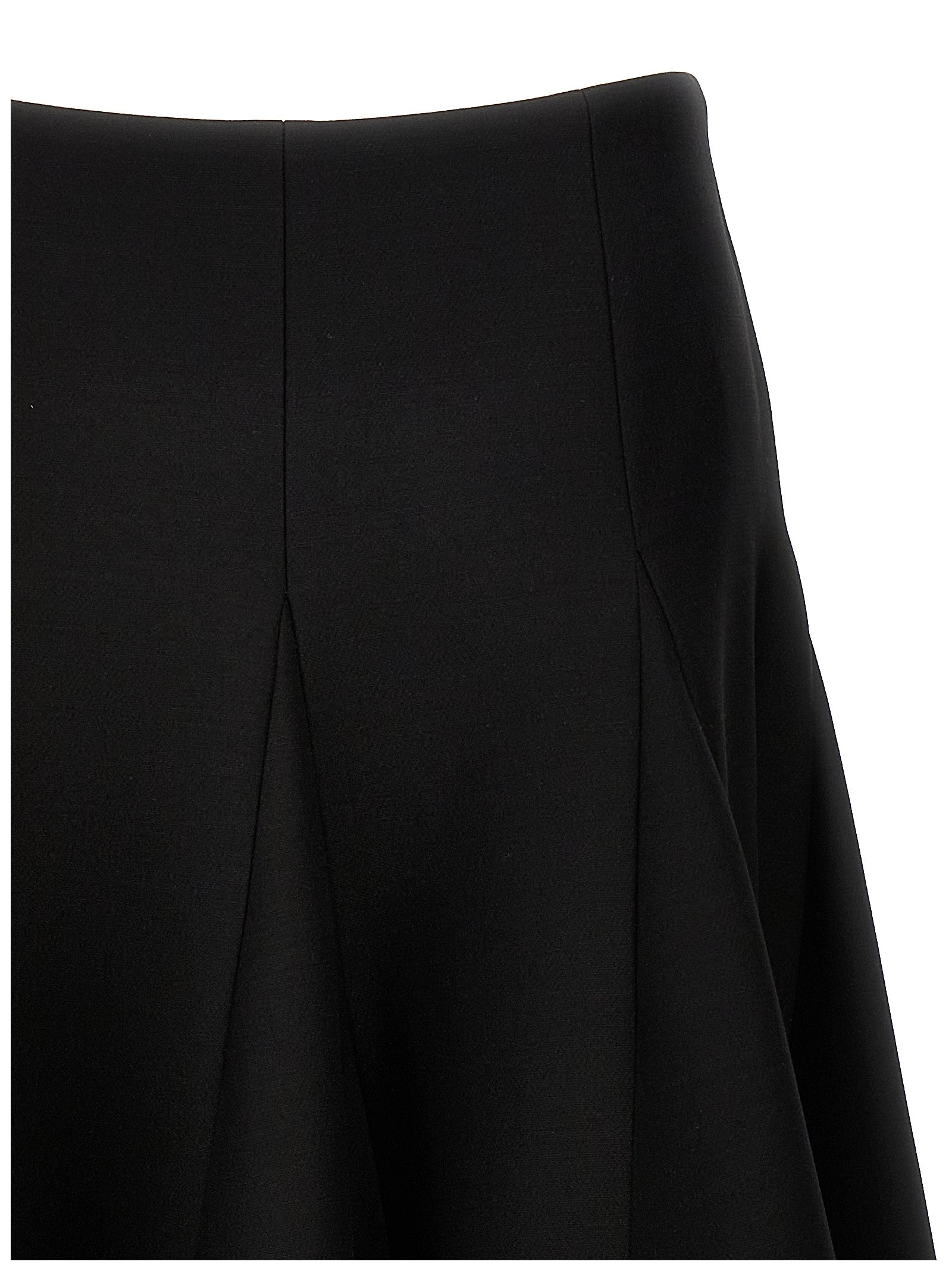 Skirt by Valentino Garavani for women in silk crepe & virgin wool black features a contoured silhouette from the Women's Silk Crepe & Virgin Wool Mini Skirt collection, characterized by its contoured mini for a contoured finish.