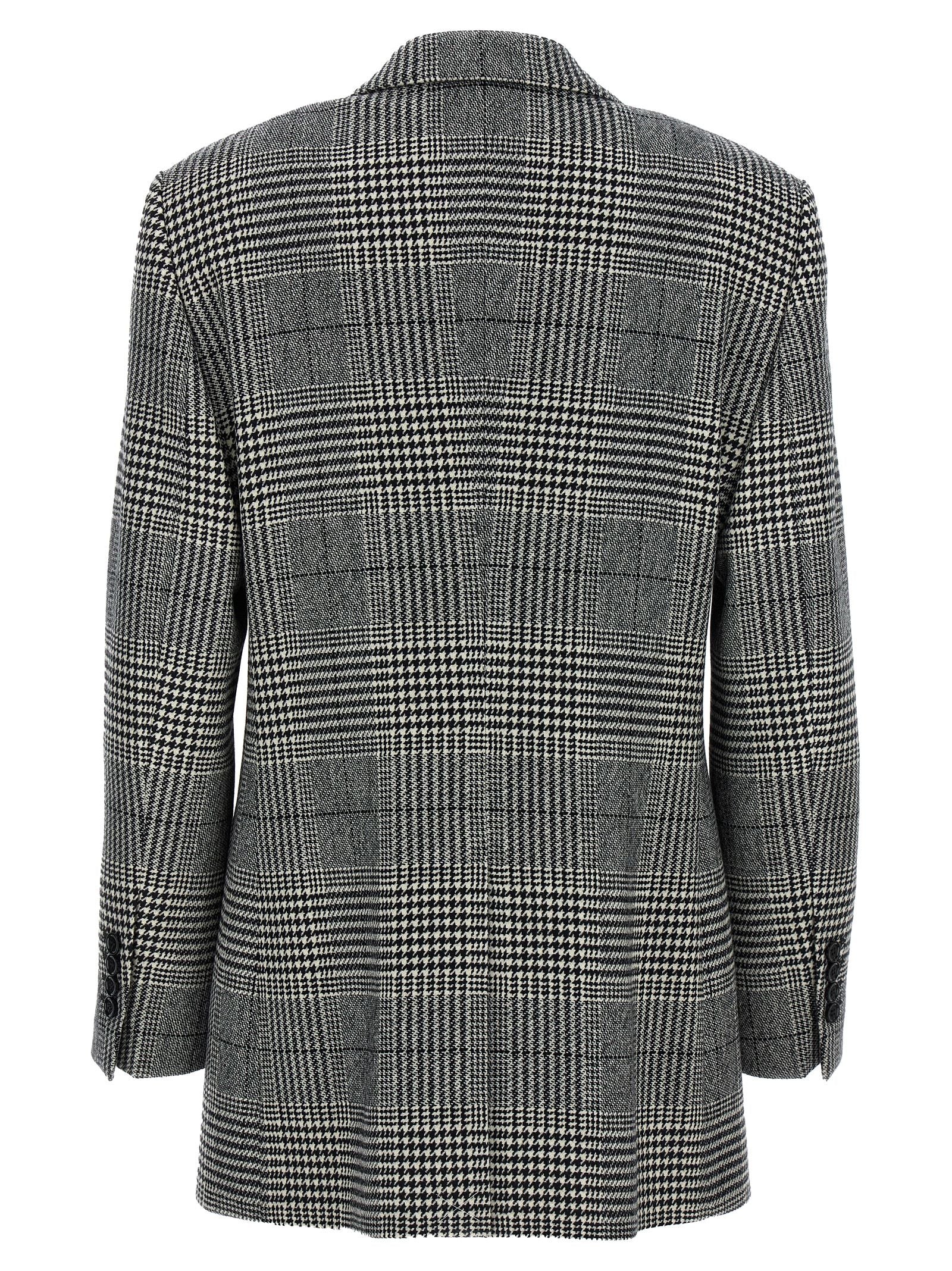 Blazer by Dolce & Gabbana for women in cashmere bicolour, black, white, patterned & houndstooth showcases a polished silhouette, highlighted by a refined split neckline and polished for a sophisticated finish.