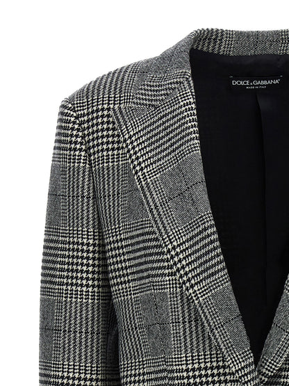 Blazer by Dolce & Gabbana for women in cashmere bicolour, black, white, patterned & houndstooth features an sartorial silhouette, showcasing a sophisticated split neckline and sartorial for a truly sartorial finish.
