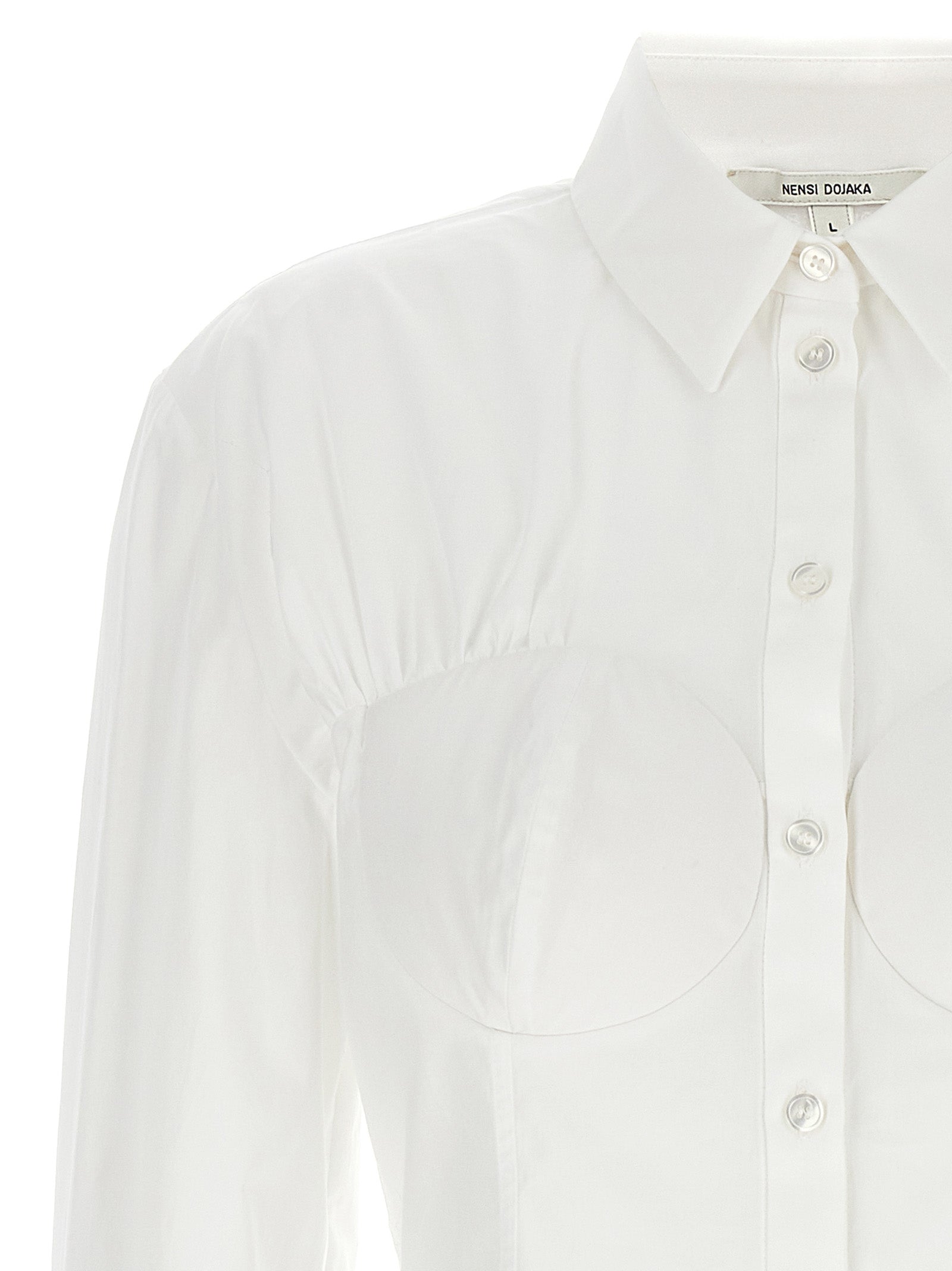 Blouse by Nensi Dojaka for women in cotton white showcases a sleek silhouette, elegantly detailed with a sleek and for a sleek finish.
