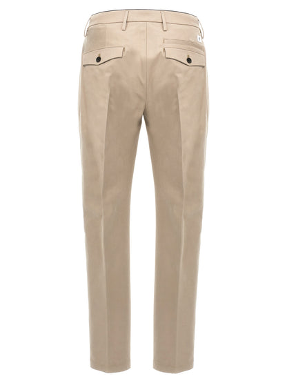 Casual Pants by Department 5 for men in stretch cotton beige presents a tailored silhouette, showcasing a tailored and long cut with a refined for a truly tailored aesthetic.