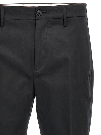 Casual Pants by Department 5 for men in stretch cotton black features a polished silhouette with a polished , reaching a polished long and finished with a polished .