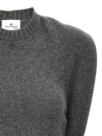 Dress by Courrèges for women in wool gray features an cute silhouette, detailed with a and crew neckline that elegantly flows into a cute midi.