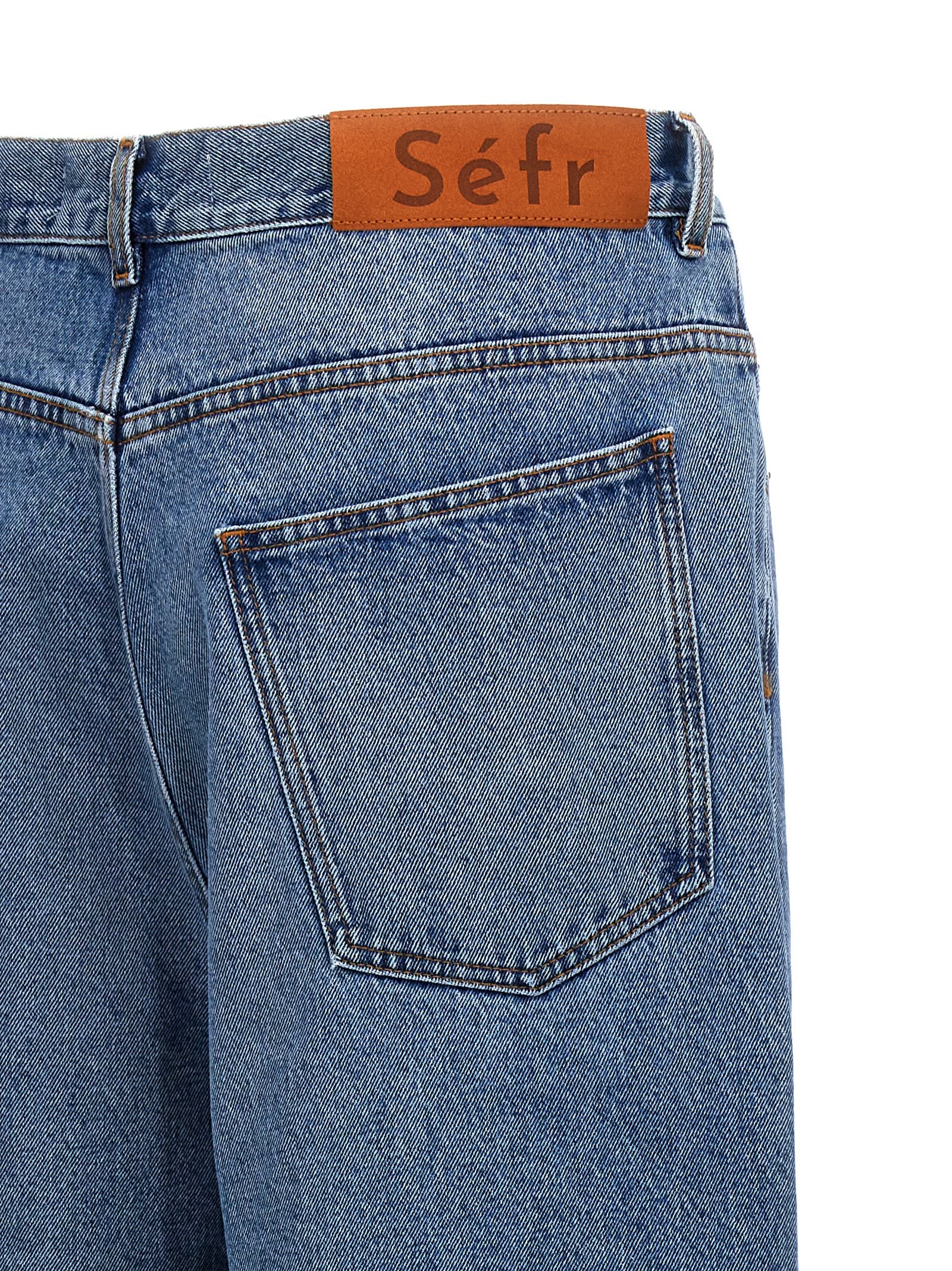 Jeans by SÉFR for men in denim cotton & suede leather blue features an sophisticated and with a precise long, creating a sophisticated and sophisticated silhouette.