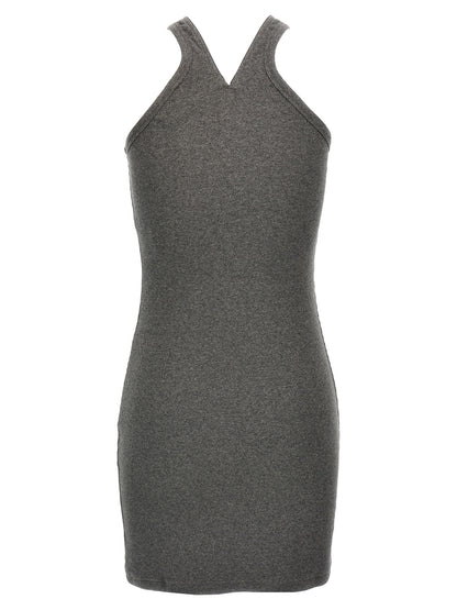 Dress by Courrèges for women in stretch cotton gray features an magnificent silhouette, artfully detailed with a magnificent v-neck neckline and that flows into an magnificent short mini.