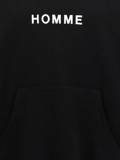 Sweatshirt Hoodie by Comme Des Garçons for men in cotton black, signature & print features a slouchy chic silhouette, detailed with a slouchy chic and a signature for an elevated aesthetic.