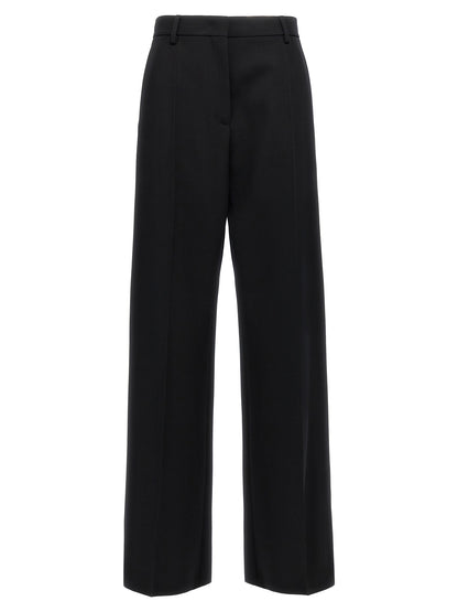 Trousers by Valentino Garavani for women in virgin wool black features a tailored silhouette with a tailored straight-leg & wide, defined by its long and a sophisticated .