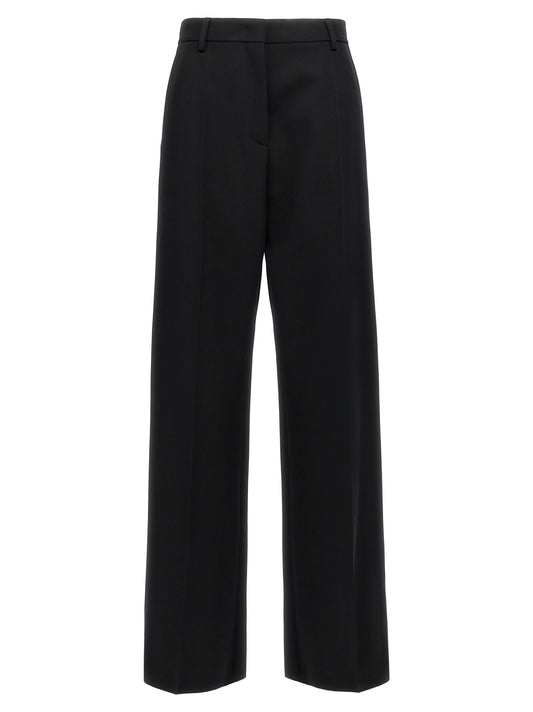 Trousers by Valentino Garavani for women in virgin wool black features a tailored silhouette with a tailored straight-leg & wide, defined by its long and a sophisticated .