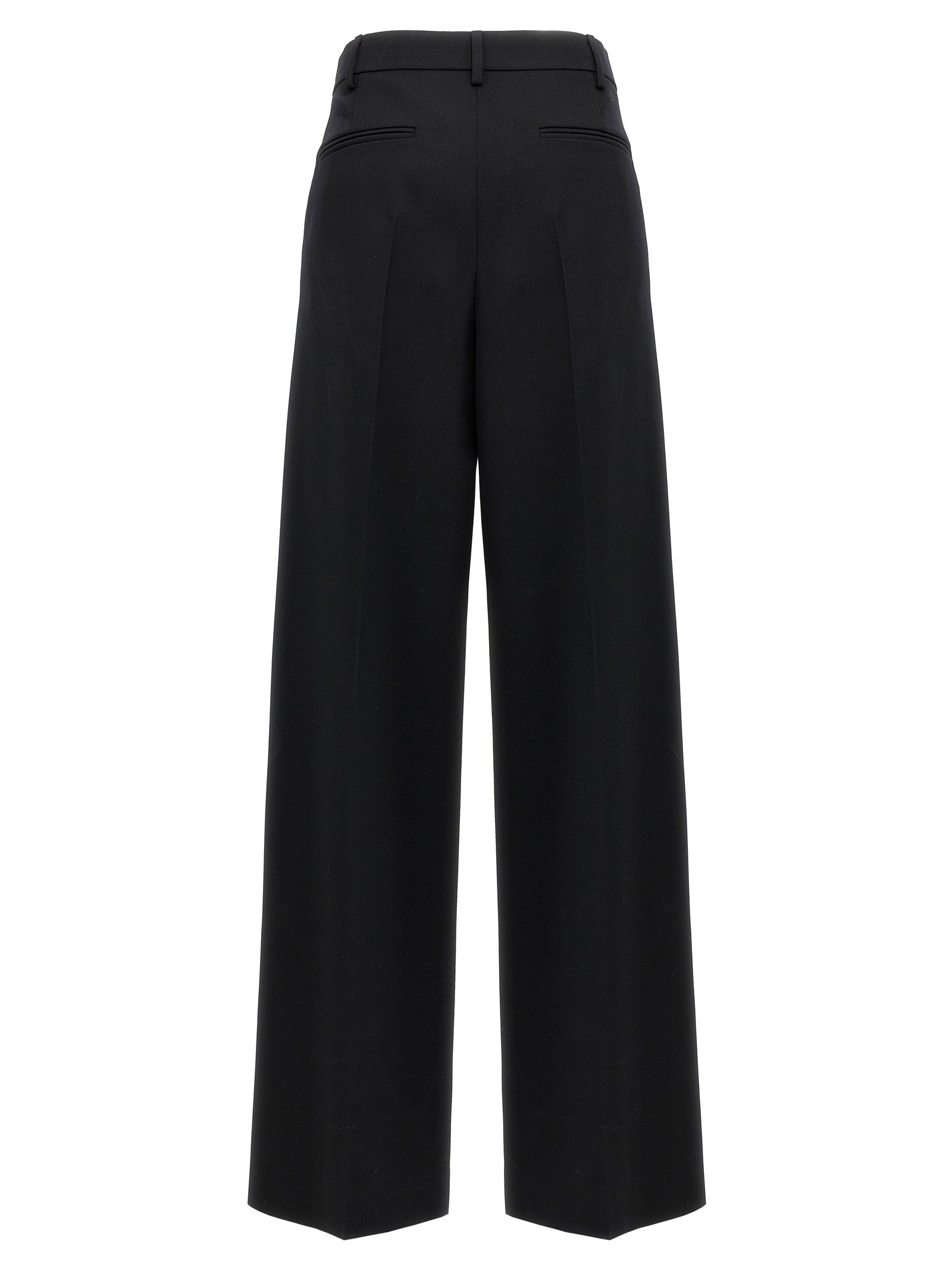 Trousers by Valentino Garavani for women in virgin wool black presents a perennial silhouette, meticulously tailored with a straight-leg & wide cut, long finish, and an elegant .