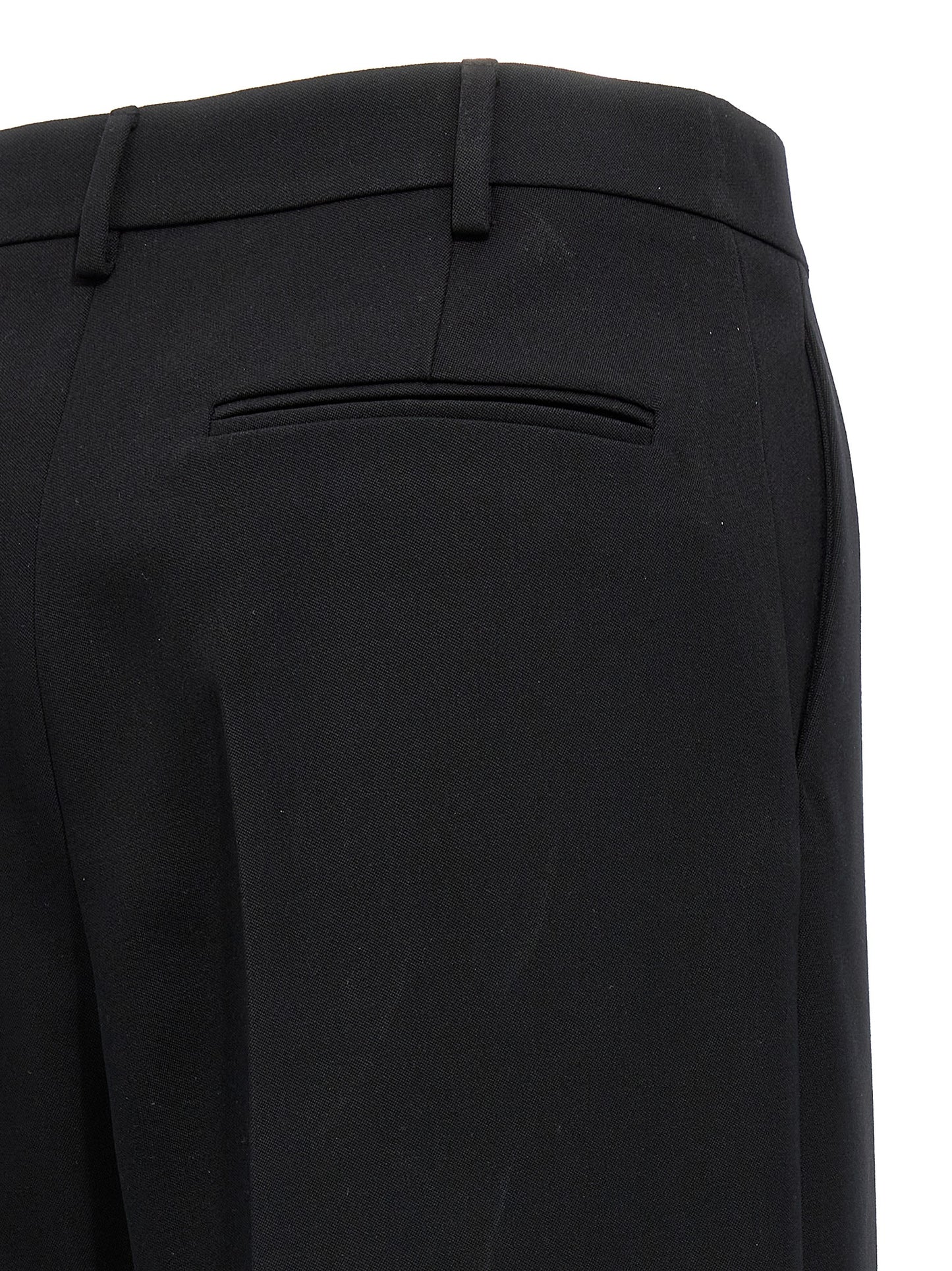 Trousers by Valentino Garavani for women in virgin wool black features an on trend silhouette, showcasing a sophisticated straight-leg & wide with a long and for an on trend finish.