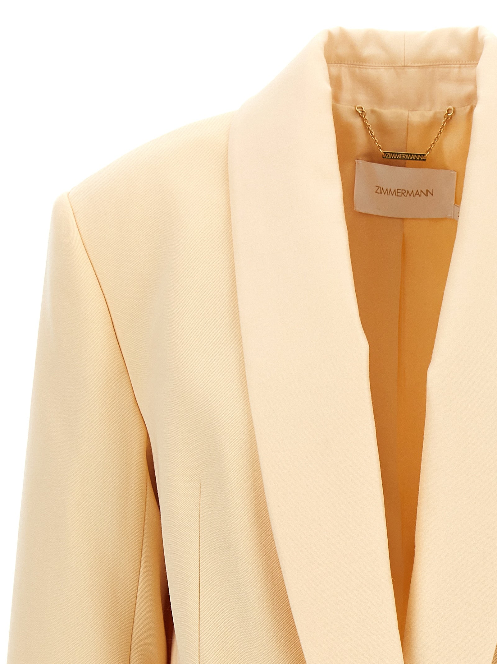 Blazer by Zimmermann for women in wool & polyester beige presents a distinguished silhouette, detailed with a distinguished shawl-collar neckline and distinctive for a truly sophisticated finish.