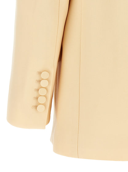 This Blazer by Zimmermann for women in wool & polyester beige presents a tailored silhouette, meticulously tailored with a tailored and distinctive for a tailored finish.