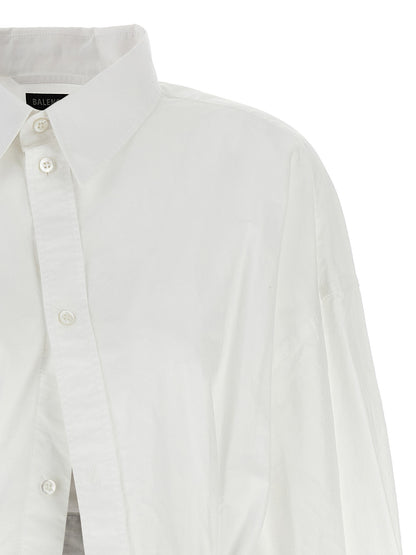 Blouse by Balenciaga for women in cotton white presents a discerning silhouette, showcasing a sophisticated and for a truly discerning finish.