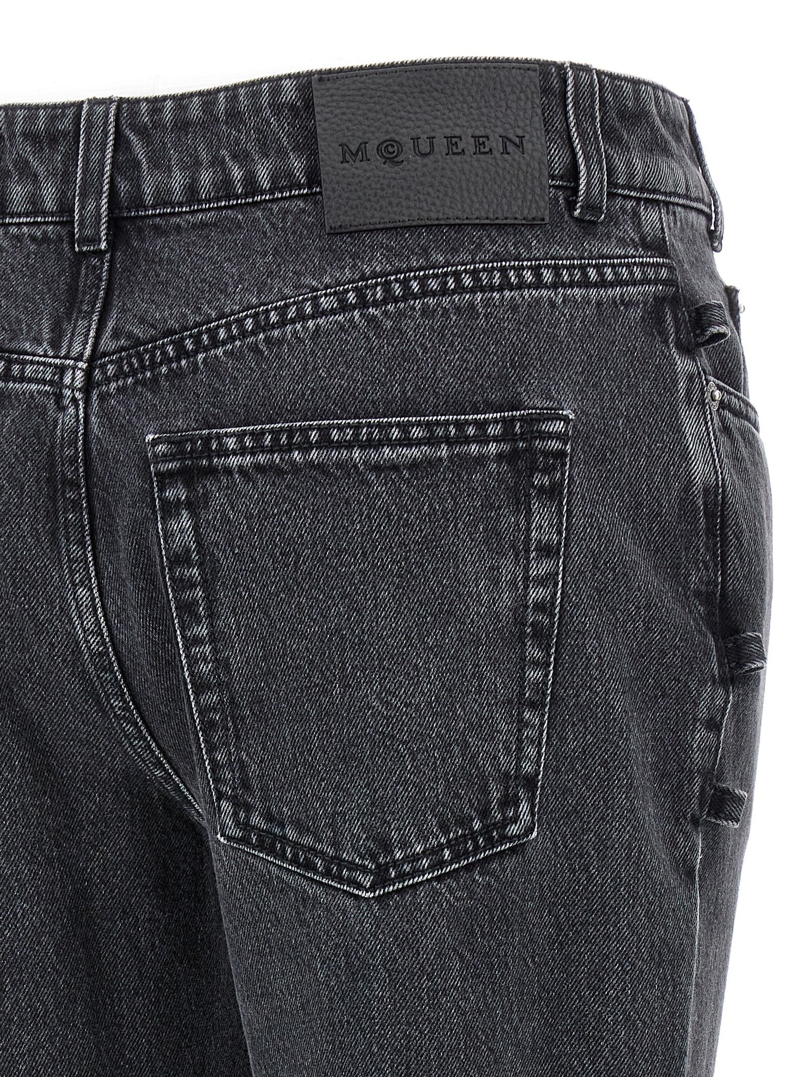 Jeans by Alexander McQueen for women in denim cotton black features a polished silhouette with a polished flared, reaching a polished long and finished with a polished .